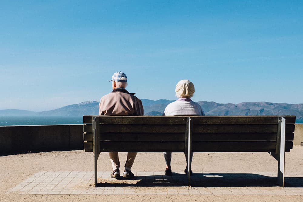 elderly people on a bench image