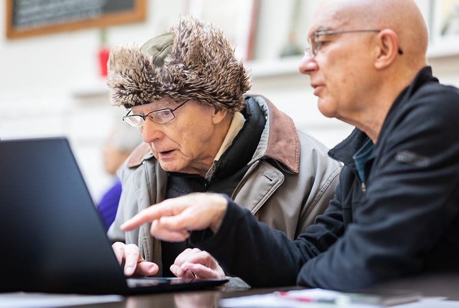 older people using a laptop image